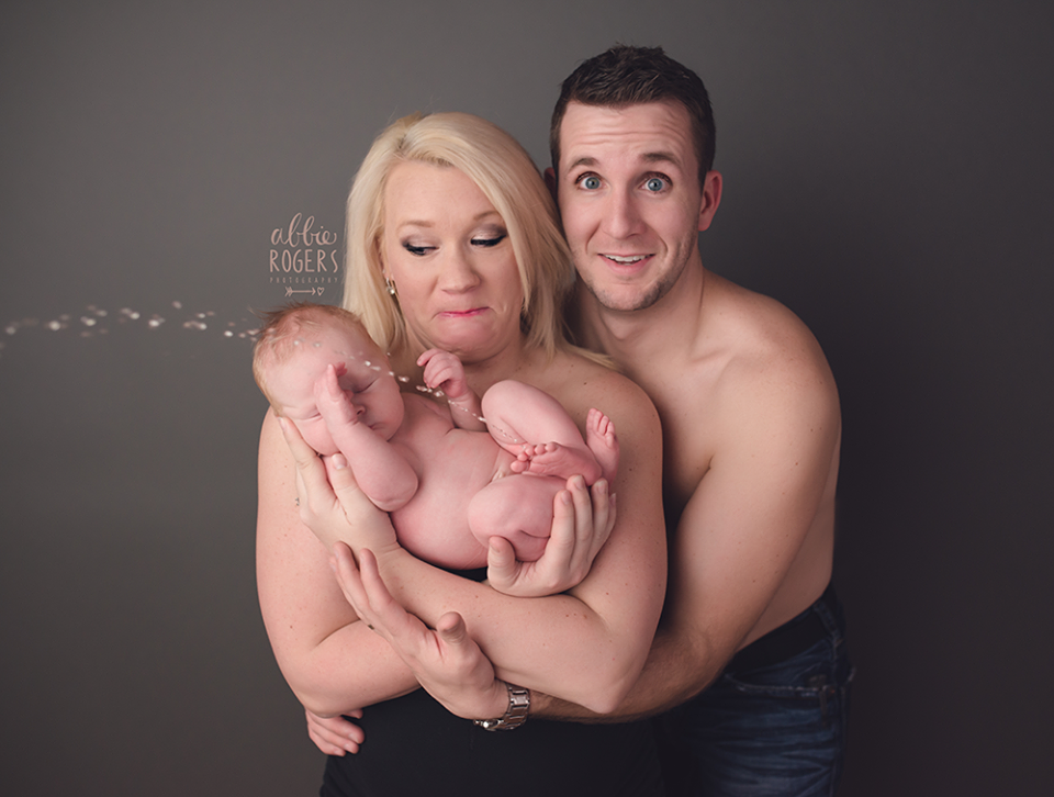 Newborn Baby Urinates On Mom And Dad During A Family Photoshoot